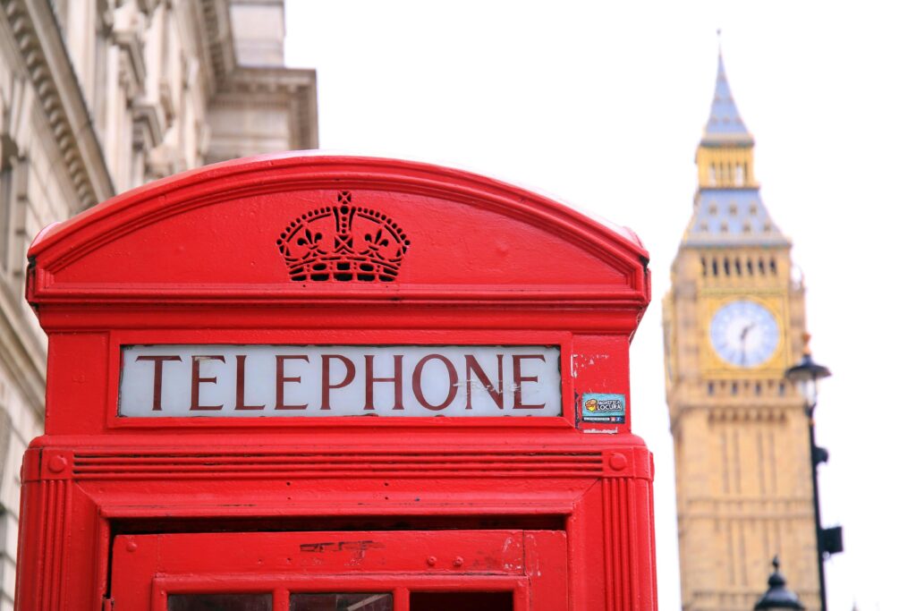 pexels-photo-221166-221166 Classic red telephone booth with Big Ben in the background, symbolizing London.