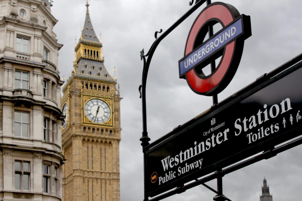 pexels-photo-89432-89432 View of Big Ben and Westminster Station sign in London, England, capturing iconic British landmarks.